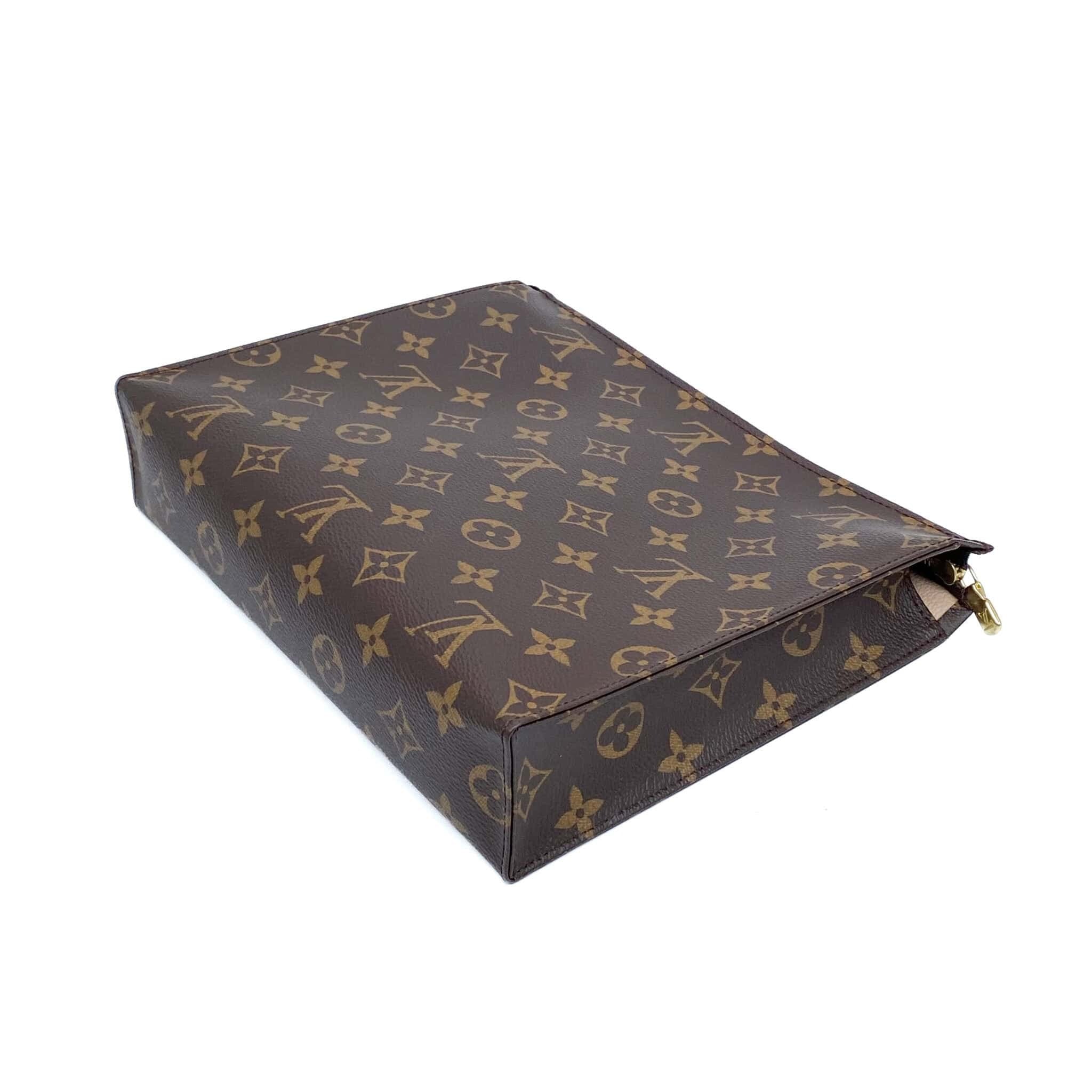 Louis Vuitton Toiletry Pouch 26 “Never Owned”
