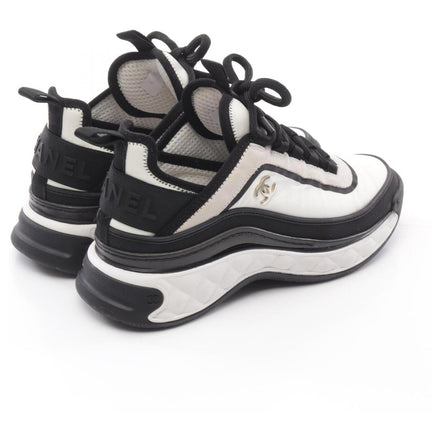 Chanel White and Black Runner Sneakers "Unworn"
