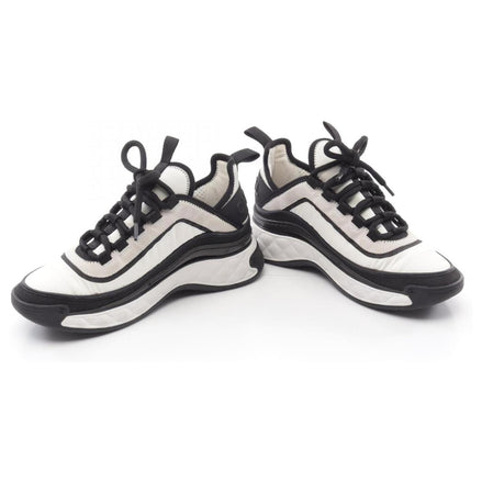 Chanel White and Black Runner Sneakers "Unworn"