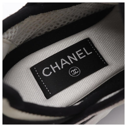 Chanel White and Black Runner Sneakers "Unworn"