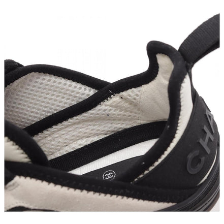 Chanel White and Black Runner Sneakers "Unworn"