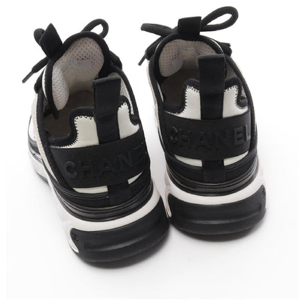 Chanel White and Black Runner Sneakers "Unworn"