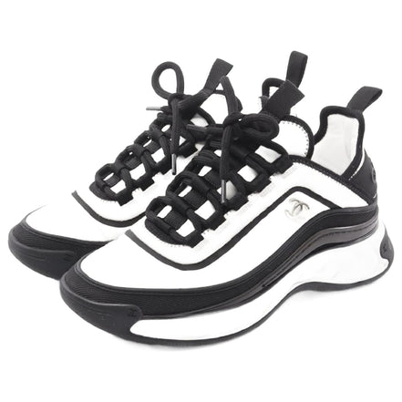 Chanel White and Black Runner Sneakers "Unworn"