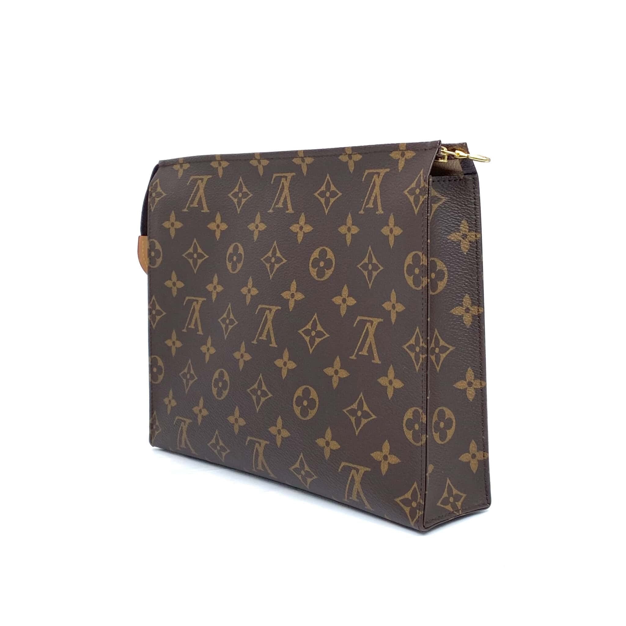 Louis Vuitton Toiletry Pouch 26 “Never Owned”
