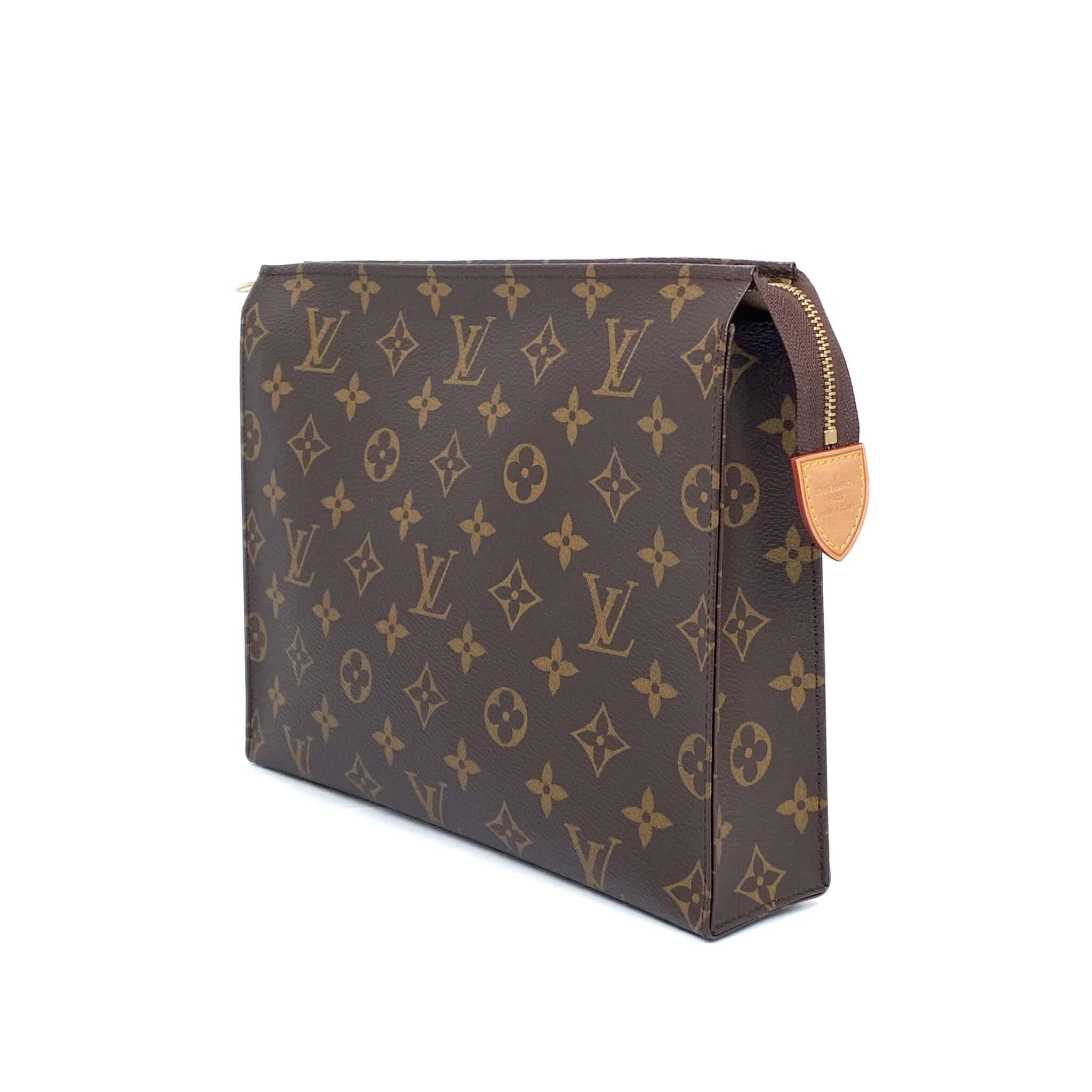 Louis Vuitton Toiletry Pouch 26 “Never Owned”